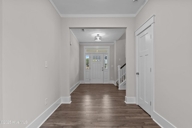 804 Winds Way, Aberdeen, NC 28315 - foyer with ornamental molding, stairs, and dark wood finished floors