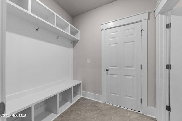 804 Winds Way, Aberdeen, NC 28315 - mudroom with baseboards and tile patterned floors