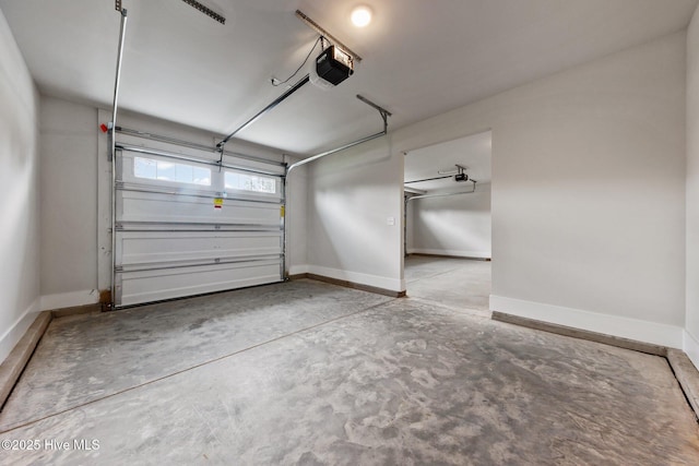 804 Winds Way, Aberdeen, NC 28315 - garage with a garage door opener and baseboards