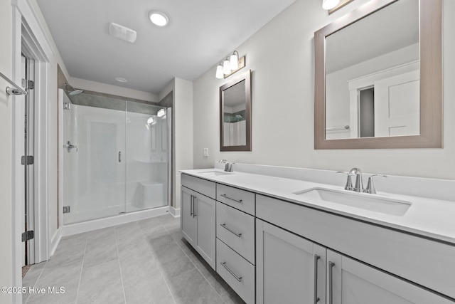 804 Winds Way, Aberdeen, NC 28315 - full bath with a stall shower, double vanity, and tile patterned floors