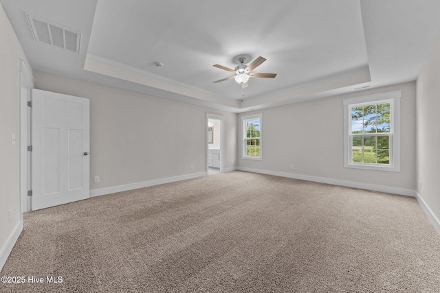 804 Winds Way, Aberdeen, NC 28315 - carpeted spare room with a raised ceiling and ceiling fan