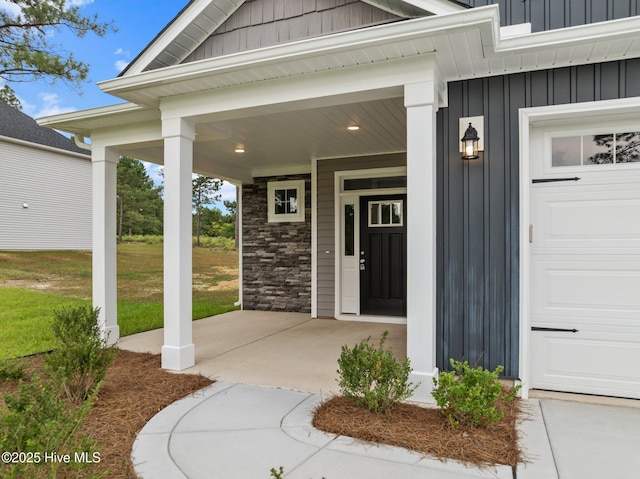 804 Winds Way, Aberdeen, NC 28315 - doorway to property featuring board and batten siding and covered porch