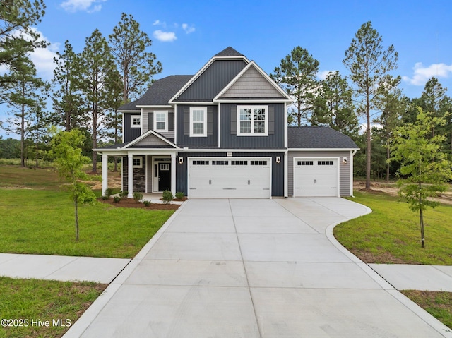 804 Winds Way, Aberdeen, NC 28315 - craftsman-style home with driveway, board and batten siding, a front lawn, and a porch