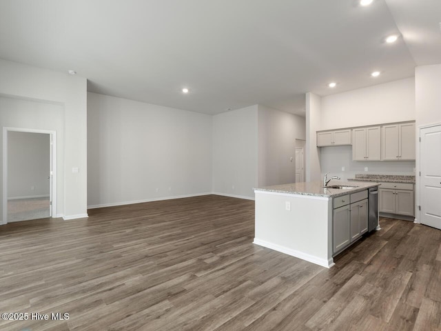 113 Legare St Lot 254, Wilmington, NC 28411 - kitchen with wood finished floors, recessed lighting, light stone counters, stainless steel dishwasher, and a kitchen island with sink
