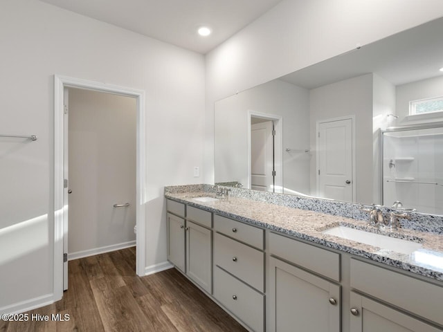 113 Legare St Lot 254, Wilmington, NC 28411 - full bath with double vanity, wood finished floors, and recessed lighting