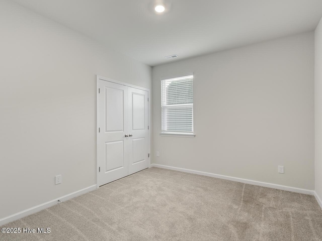 113 Legare St Lot 254, Wilmington, NC 28411 - unfurnished bedroom featuring carpet flooring and baseboards
