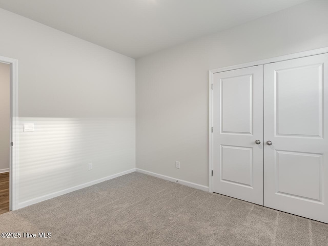 113 Legare St Lot 254, Wilmington, NC 28411 - unfurnished bedroom featuring carpet floors and a closet