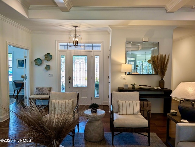 foyer entrance featuring wood finished floors and crown molding