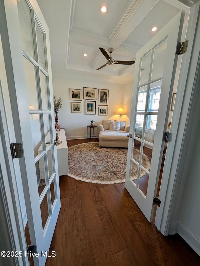 entryway with french doors, dark wood-style floors, coffered ceiling, beamed ceiling, and ornamental molding
