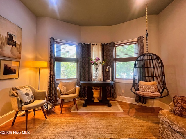 1120 S 3rd St, Wilmington, NC 28401 - living area with wood finished floors, healthy amount of natural light, and baseboards