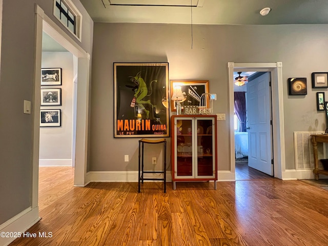 1120 S 3rd St, Wilmington, NC 28401 - interior space featuring attic access, wood finished floors, and baseboards