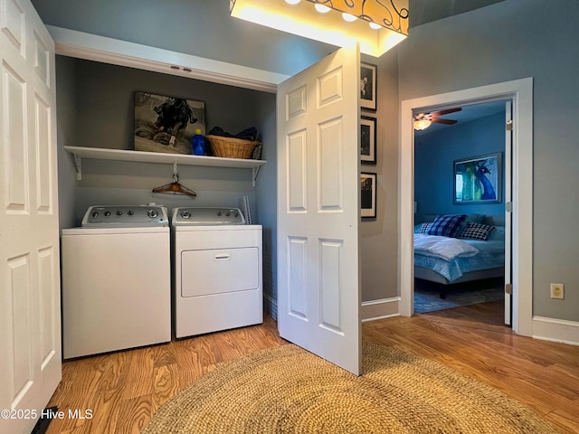 1120 S 3rd St, Wilmington, NC 28401 - laundry room featuring washer and dryer, light wood-type flooring, ceiling fan, and baseboards