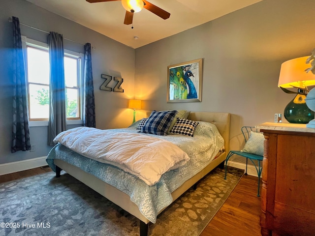 1120 S 3rd St, Wilmington, NC 28401 - bedroom with wood finished floors, baseboards, and a ceiling fan