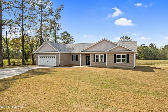 2657 Ash Little River Rd NW, Longwood, NC 28452 - view of front of home with concrete driveway, a garage, roof with shingles, and a front lawn