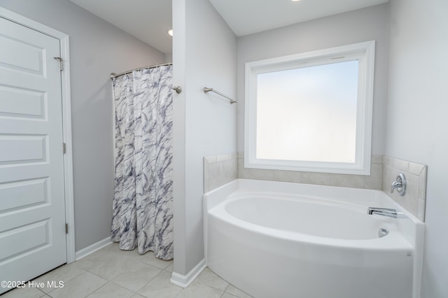 330 Independence Blvd, Newport, NC 28570 - full bathroom with baseboards, tile patterned flooring, a garden tub, and a shower with shower curtain