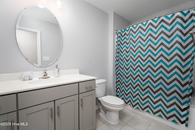 330 Independence Blvd, Newport, NC 28570 - bathroom featuring curtained shower, vanity, toilet, and tile patterned floors