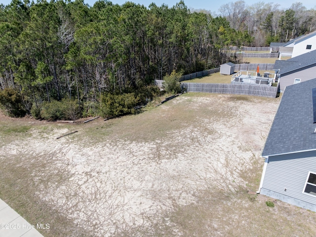 330 Independence Blvd, Newport, NC 28570 - view of yard with a wooded view and fence