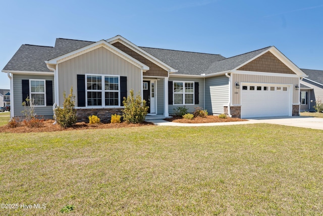 330 Independence Blvd, Newport, NC 28570 - craftsman inspired home with a front lawn, board and batten siding, an attached garage, and stone siding