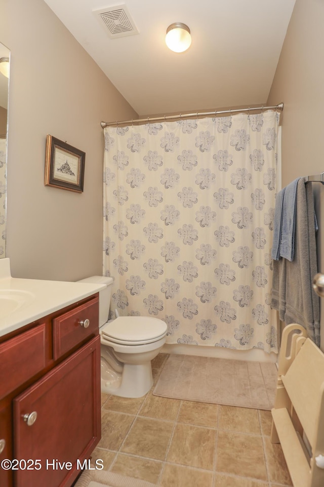 202 Peggys Trce, Sneads Ferry, NC 28460 - full bath featuring tile patterned floors, toilet, curtained shower, vanity, and visible vents