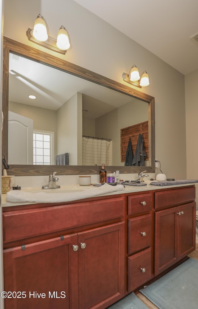 202 Peggys Trce, Sneads Ferry, NC 28460 - bathroom with double vanity, visible vents, and a sink
