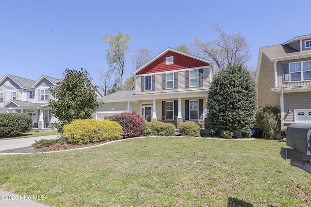 202 Peggys Trce, Sneads Ferry, NC 28460 - view of front of property with a garage and a front yard