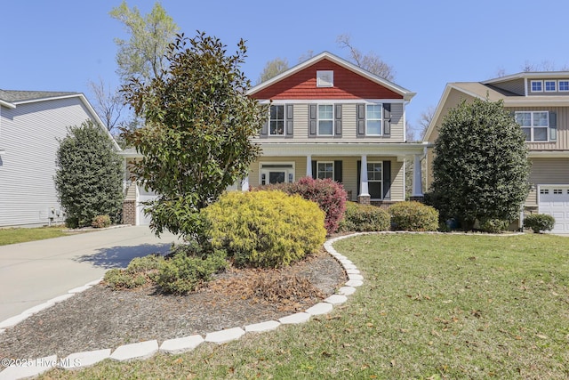 202 Peggys Trce, Sneads Ferry, NC 28460 - view of front of home featuring driveway and a front yard