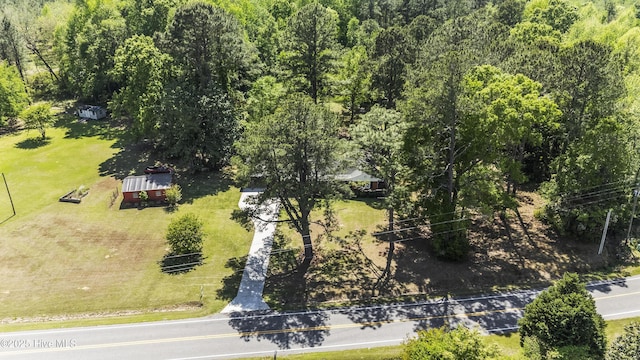 aerial view with a wooded view