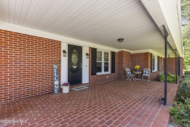 view of patio featuring a porch