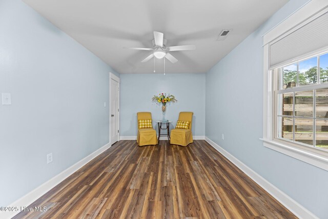 1450 State Camp Rd, Vanceboro, NC 28586 - unfurnished room with a ceiling fan, dark wood-type flooring, and baseboards