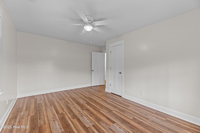 1450 State Camp Rd, Vanceboro, NC 28586 - empty room with wood finished floors, baseboards, and ceiling fan