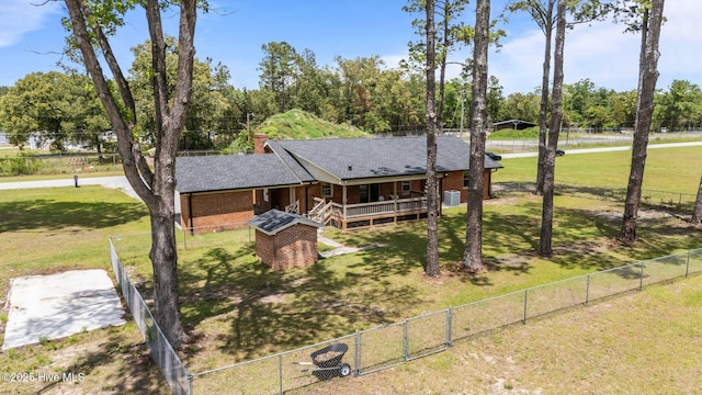 1450 State Camp Rd, Vanceboro, NC 28586 - view of front of house with a chimney, brick siding, view of wooded area, and a shingled roof
