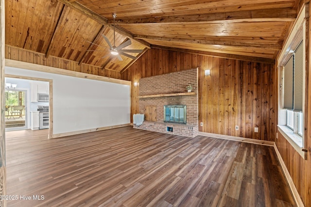 1450 State Camp Rd, Vanceboro, NC 28586 - unfurnished living room with wooden ceiling, wood walls, ceiling fan, wood finished floors, and a fireplace