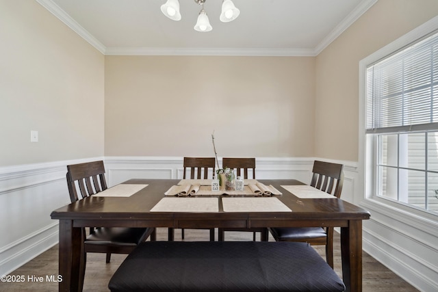 313 March Sea Ln, Jacksonville, NC 28546 - dining space with a chandelier, ornamental molding, wood finished floors, and wainscoting
