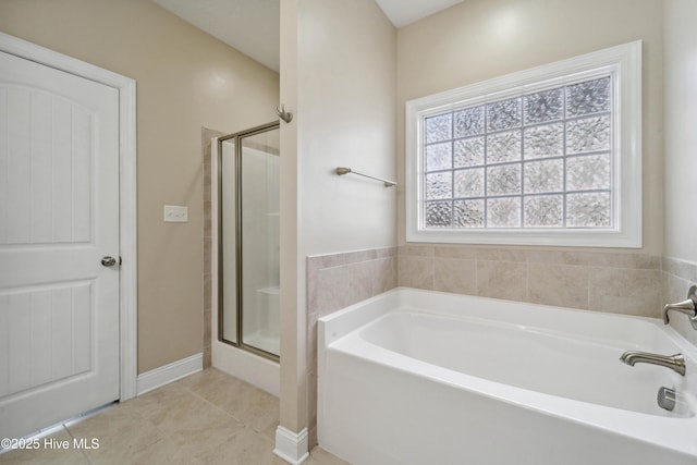313 March Sea Ln, Jacksonville, NC 28546 - full bath with a garden tub, a stall shower, tile patterned floors, and baseboards