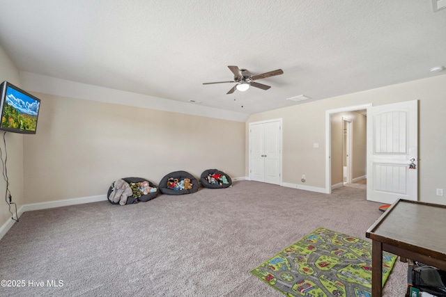 313 March Sea Ln, Jacksonville, NC 28546 - rec room with a ceiling fan, baseboards, carpet, and a textured ceiling