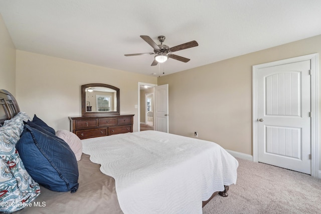 313 March Sea Ln, Jacksonville, NC 28546 - bedroom with light colored carpet, ceiling fan, and baseboards