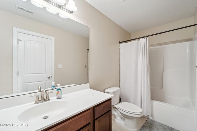 313 March Sea Ln, Jacksonville, NC 28546 - full bathroom featuring vanity, toilet, tile patterned flooring, and shower / bath combination with curtain