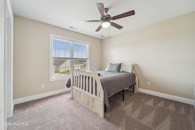313 March Sea Ln, Jacksonville, NC 28546 - bedroom featuring carpet floors, baseboards, and ceiling fan