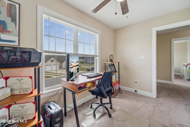 313 March Sea Ln, Jacksonville, NC 28546 - home office with a ceiling fan, carpet flooring, and baseboards