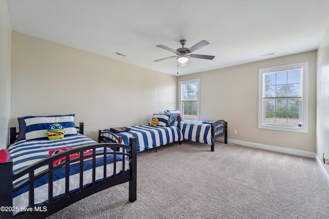 313 March Sea Ln, Jacksonville, NC 28546 - bedroom with carpet floors, baseboards, and a ceiling fan