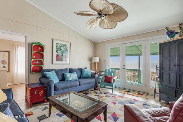 3325 W Beach Dr, Oak Island, NC 28465 - living area with vaulted ceiling, wood finished floors, french doors, crown molding, and ceiling fan