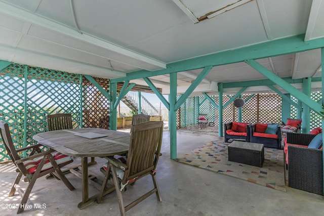 3325 W Beach Dr, Oak Island, NC 28465 - view of patio / terrace featuring an outdoor living space and outdoor dining space