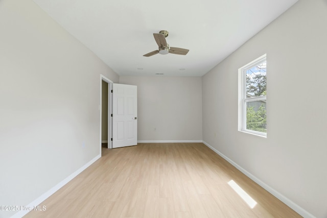 810 Morgan St, Elizabeth City, NC 27909 - spare room featuring light wood-style floors, baseboards, and ceiling fan