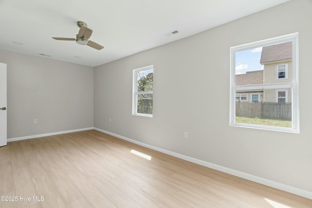 810 Morgan St, Elizabeth City, NC 27909 - empty room featuring baseboards, visible vents, a ceiling fan, and light wood finished floors