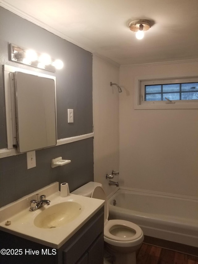 403 Jamesville Rd, Williamston, NC 27892 - bathroom featuring  shower combination, toilet, vanity, and wood finished floors