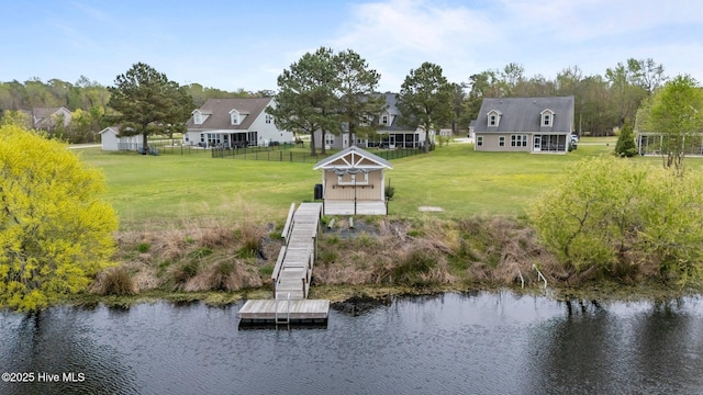 405 Antioch Lakes Rd, New Bern, NC 28560 - view of dock featuring a water view, fence, and a lawn
