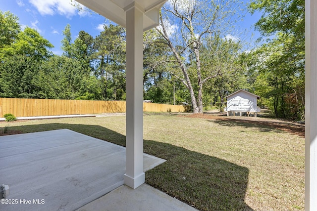 view of yard with a patio area and fence