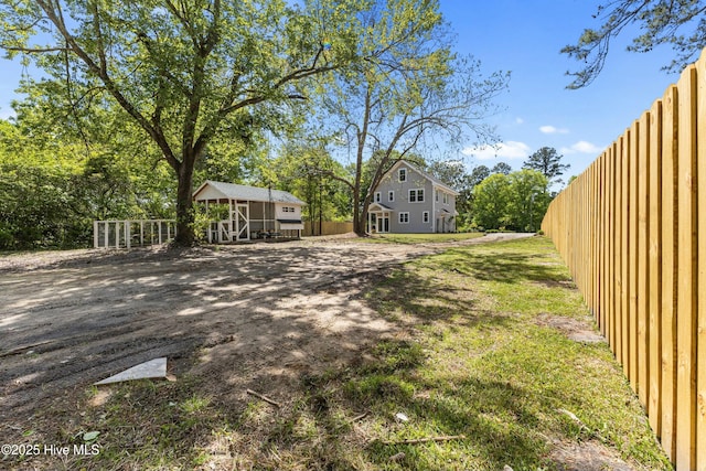 view of yard featuring fence