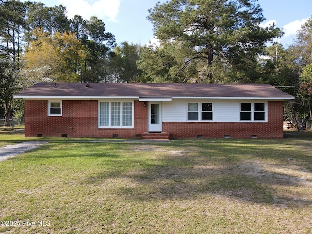 single story home featuring entry steps, a front yard, brick siding, and crawl space