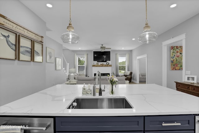 732 Avila Ave, Hampstead, NC 28443 - kitchen with a sink, open floor plan, dishwasher, recessed lighting, and hanging light fixtures
